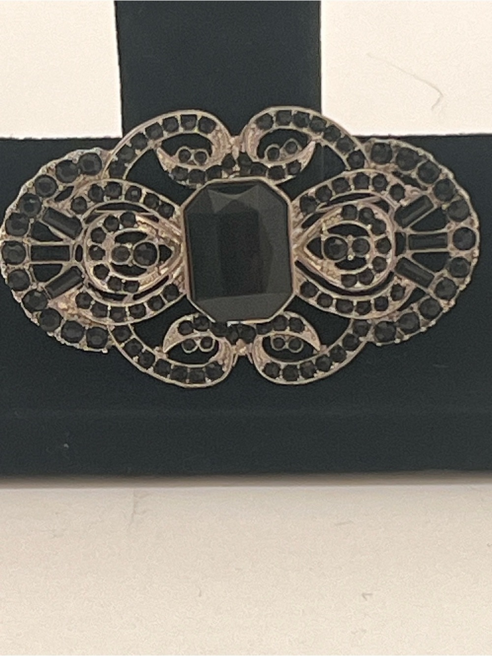 Elegant Black Filigree Brooch with Faceted Jet Stone